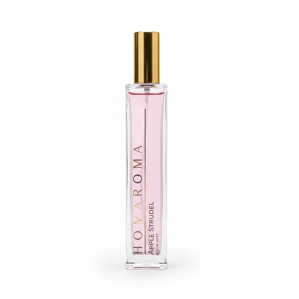 Homaroma Apple Strudel room mist in a tall, slender glass bottle with a gold cap and light pink fragrance liquid.