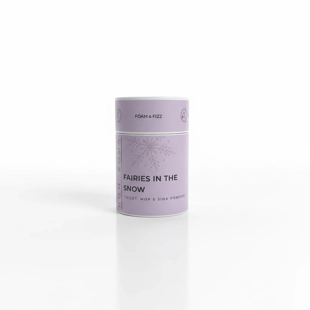 Homaroma Fairies in the Snow Foam and Fizz cleaning powder in a light purple cylindrical container.