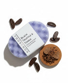 Homaroma Black Truffle & Tonka exfoliating soap-filled sponge in lavender, with cocoa beans and truffle shavings.