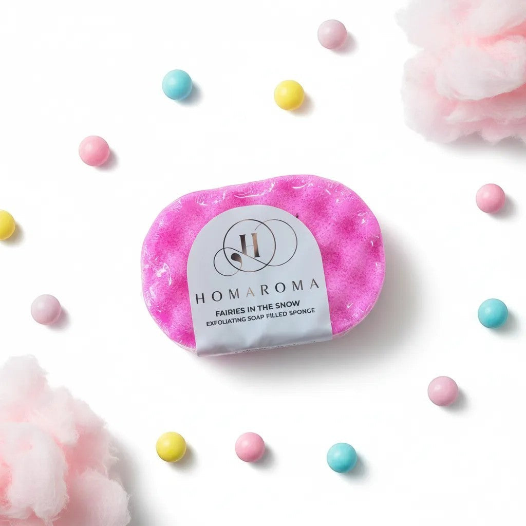 Homaroma Fairies in the Snow pink exfoliating soap-filled sponge with dual-sided texture and sweet fruity scent.