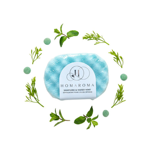 Homaroma Samphire & Water Mint exfoliating soap filled sponge, light blue, with mint and green accents.