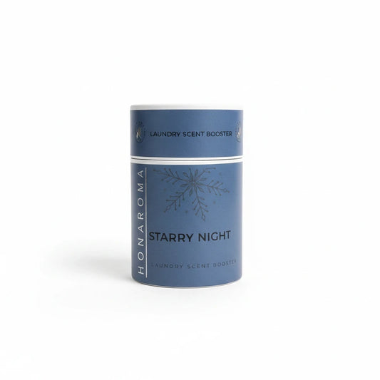 Homaroma Starry Night laundry scent booster in a blue cylindrical container with a snowflake design