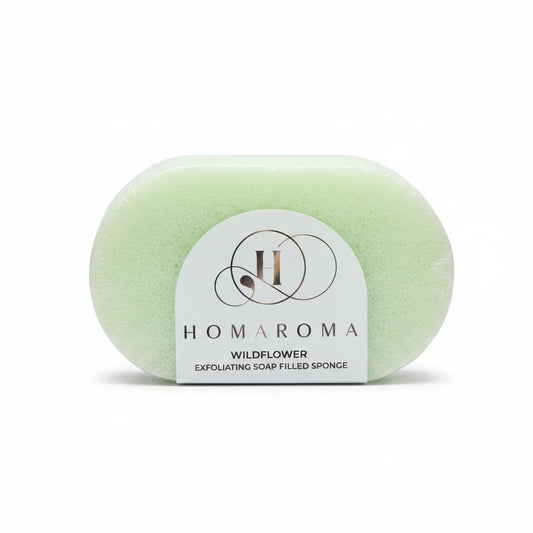 Homaroma Wildflower exfoliating soap-filled sponge in a soft pale green colour with white branding label
